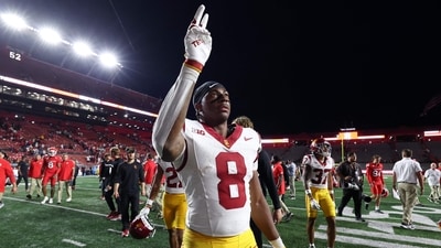 Dante Moore sustained a heavy hit from Trojans linebacker Desman Stephens II. (Getty Images via AFP)