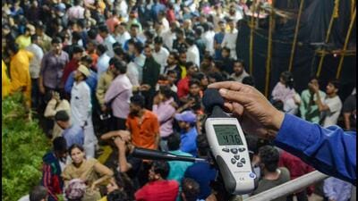 Pune, India - Sept. 12, 2019:Official from Maharashtra Pollution Control Board recorded a noise level during the Ganpati immersion procession at Vishrambag chowk in Pune, India, on Thursday, September 12, 2019. (Photo by Milind Saurkar/Hindustan Times) (Milind Saurkar/HT Photo) Pune, India - Sept. 12, 2019:Official from Maharashtra Pollution Control Board recorded a noise level during the Ganpati immersion procession at Vishrambag chowk in Pune, India, on Thursday, September 12, 2019. (Photo by Milind Saurkar/Hindustan Times) (Milind Saurkar/HT Photo)