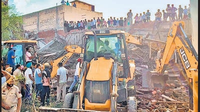 Rescue operation underway after a three-story under-construction building collapsed at Dhulkot village, in Ambala on Sunday. (ANI Video Grab)