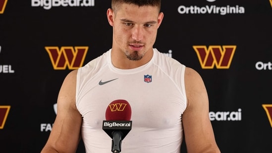 Leo Chenal of the Washington Commanders speaks with the media during a joint practice at BigBear.ai Performance Center on August 12.