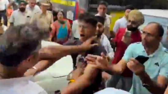 In this screengrab, Delhi PWD Minister Parvesh Verma is seen during an alleged altercation with a man in New Delhi.