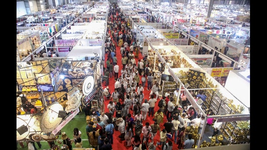 People gather during the fourth edition of the UP International Trade Show in Greater Noida onSunday (PTI)