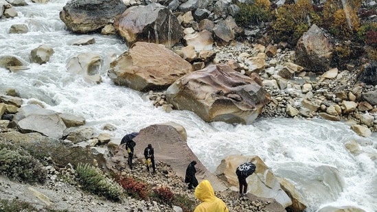 State Disaster Response Force Team carries out a search operation after a Maharashtrian resident slipped and fell into a river near the Kachhidhang slide zone, in Uttarkashi on Sunday.