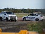 United States Air Force Police guard RAF Fairford in Fairford, England, Monday, Sept. 28, 2026. 