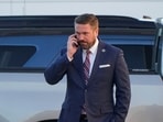 FILE PHOTO: Andrew Bailey, U.S. Deputy Director of the Federal Bureau of Investigation (FBI), speaks on the phone outside the Fulton County Election Hub and Operation Center after the FBI executed a search warrant there in relation to the 2020 election, according to a law enforcement official familiar with the matter, in Union City, Georgia, U.S. January 28, 2026. REUTERS/Elijah Nouvelage/File Photo