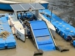 Unmanned electric boats to remove marine waste at Sassoon Dock, Jamshedji Port.