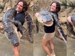 1. A viral video showed a woman zookeeper carrying a huge 250-pound alligator, leaving viewers stunned.