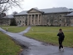 People walk on the campus of Cornell University in Ithaca, N.Y., Friday, Feb. 2, 2024.