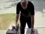 Donald Johnson, 81, went viral after being seen hauling luggage to help pay for his wife's cancer treatment.(GiveSendGo)