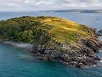 Two sisters bought an island in the 1960s and later donated it to the Cornwall Wildlife Trust, which now manages it as a nature reserve.(AI-generated/ChatGPT)