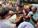 In this screengrab from a video posted on Sept 27, Delhi minister Parvesh Verma is seen during an alleged altercation with a man in West Delhi. (@AamAadmiParty/via PTI)