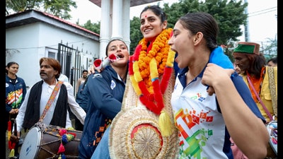 Asian Games gold medalist kabaddi player Pushpa Rana being welcomed upon her arrival in Dharamshala on Monday. (PTI) Asian Games gold medalist kabaddi player Pushpa Rana being welcomed upon her arrival in Dharamshala on Monday. (PTI)