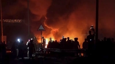 Smoke billows from a fire during a protest by students at the Lovely Professional University (LPU) campus, in Phagwara, Punjab, early Sunday. Students went on a rampage on the campus early Sunday, damaging property and blocking a national highway over claims that an outsider raped a female student on the university premises. (PTI)
