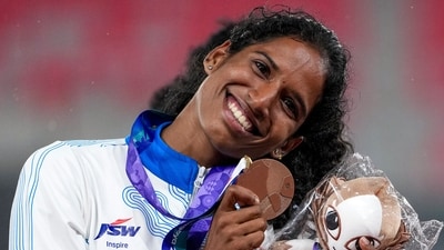 Indian hurdler Vithya Ramraj poses with her bronze medal in Nagoya on Monday,. (PTI) Indian hurdler Vithya Ramraj poses with her bronze medal in Nagoya on Monday,. (PTI)