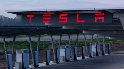 Tesla stock could face pressure if rising oil prices trigger inflation and an S&P 500 downturn. (REUTERS)