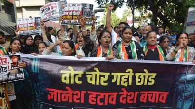 Workers of the NCP (SP) staged a protest against chief election commissioner Gyanesh Kumar and the Election Commission of India, alleging irregularities in the SIR process. (Praful Gangurde / Hindustan Times) Workers of the NCP (SP) staged a protest against chief election commissioner Gyanesh Kumar and the Election Commission of India, alleging irregularities in the SIR process. (Praful Gangurde / Hindustan Times)