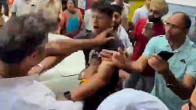 In this screengrab from a video posted on Sept 27, Delhi minister Parvesh Verma is seen during an alleged altercation with a man in West Delhi. (@AamAadmiParty/via PTI)