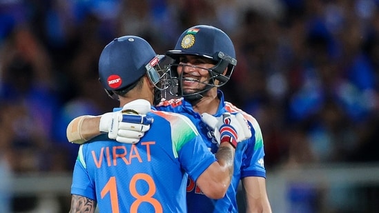 India's Virat Kohli celebrates his half century with skipper Shubman Gill during the 1st ODI.