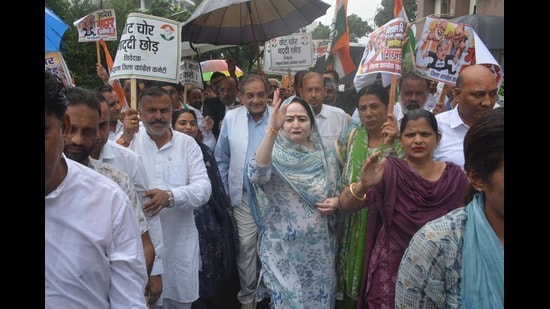 Congress party's protest outside the deputy commissioner's office demanding the resignation of Chief Election Commissioner at Panchkula on Monday. (Sant Arora /HT)