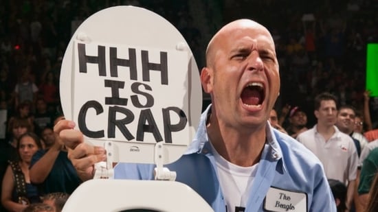 Triple H remembered longtime fan Rick “Sign Guy” Achberger after his death at 54.