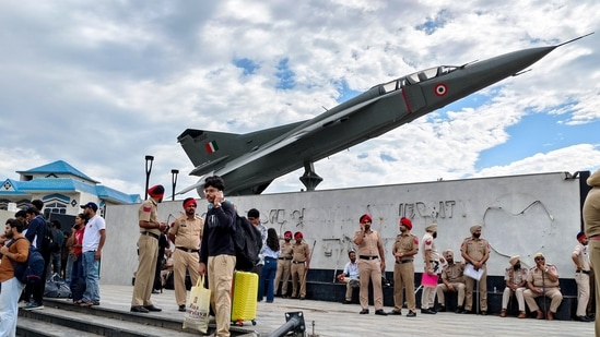 Punjab Police personnel stand guard at the Lovely Professional University (LPU) campus as students depart for their hometowns, in Phagwara, Punjab, Monday, Sept. 28, 2026.