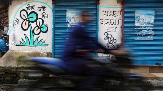 A TMC symbol graffiti drawn on a wall at Kalighat, in Kolkata.
