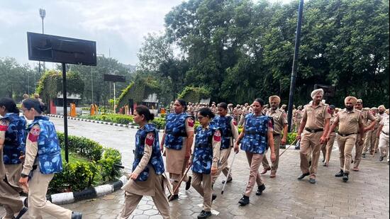 Police personnel, supervised by SSPs from 10 districts, were stationed on the Lovely Professional University, Phagwara, campus on Monday. (HT Photo)