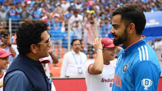 Virat Kohli, right, has brushed off comparisons with the great Sachin Tendulkar(AFP)