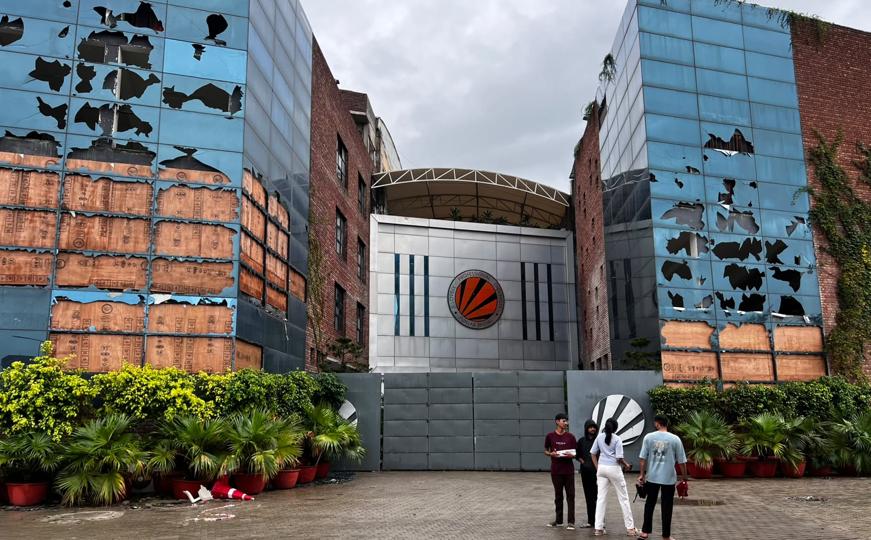 Vandalised buildings on the LPU campus on Monday morning. The Punjab DGP said police are scanning CCTV footage and social media videos to identify perpetrators, noting outside miscreants were involved in the arson. (HT Photo) Vandalised buildings on the LPU campus on Monday morning. The Punjab DGP said police are scanning CCTV footage and social media videos to identify perpetrators, noting outside miscreants were involved in the arson. (HT Photo)