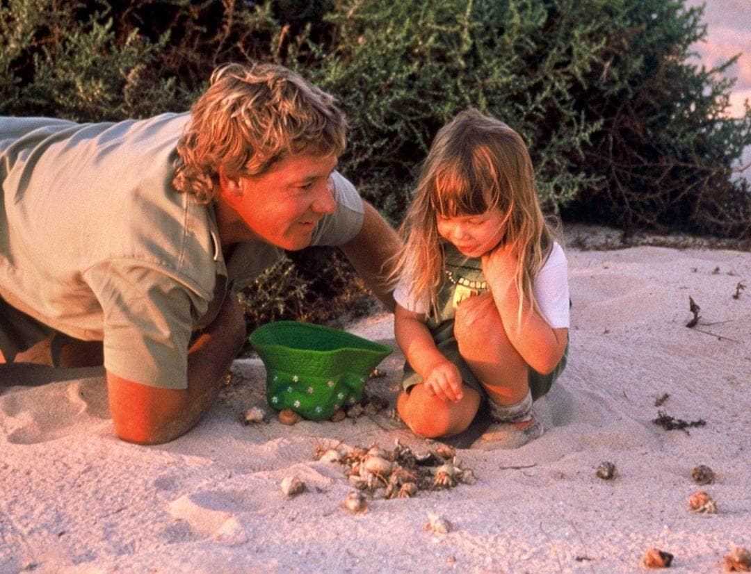 Steve Irwin and his daughter. The conservation work he started at Ironbark Station is still going, decades later. (Instagram/@bindisueirwin)