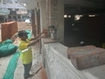 An exercise was initiated on Tuesday to strengthen the multi-storey residential building at Wazirganj by placing multiple jacks, a parallel brick pillar to provide extra support after a pillar developed cracks, forcing emergency evacuation of 25 families on Monday. (Sourced)