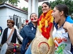 Asian Games gold medalist kabaddi player Pushpa Rana being welcomed upon her arrival in Dharamshala on Monday. (PTI)