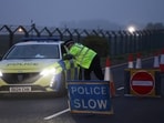 Armed guards continued to maintain a cordon around a nearby village, and police patrolled around the airfield.