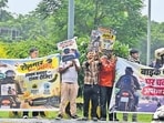 Bike-taxi riders protesting at the Tribune Chowk in Chandigarh on Monday. (Ravi Kumar/HT)