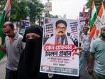 Congress party workers participate in a protest rally against the arrest of Milan Pradhan in Kolkata, West Bengal on September 19. (PTI)