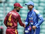 India's Captain Shubman Gill shakes hands with West Indies Captain Shai Hope before the start of the 1st ODI match between West Indies and India at the Greenfield International Stadium, in Thiruvananthapuram. (ANI Photo)