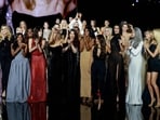 Walking shoulder-to-shoulder were screen legends, champion athletes, and style icons: Iris Berben, Heidi Klum, Beatrice Vio, Aja Naomi King, Viola Davis, Cara Delevingne, Celine Dion, Aishwarya Rai, Simone Ashley, Eva Longoria, Kendall Jenner and Andie MacDowell, among others.