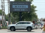 Gurugram Traffic Police installed a digital display board at Sohna Chowk to help motorists check their e-challans, PUC certificates, and vehicle insurance status near Jail Chowk, 01 August 2026. (Photo by Parveen Kumar/Hindustan Times)