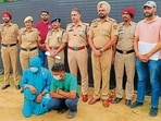 The accused in police custody on Monday. (HT File)