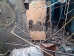 Wreckage of a house after a domestic LPG cylinder exploded, causing a two-storey building to collapse, at Malwan, in Fatehpur district, Monday. (PTI)