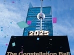 The Constellation Ball rises above One Times Square during preparations for the New Year’s Eve celebration