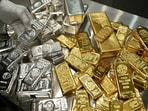 Gold steadied on Tuesday but remained near its seven-week low as investors assessed the possibility of US interest rates staying higher for longer. (Reuters)