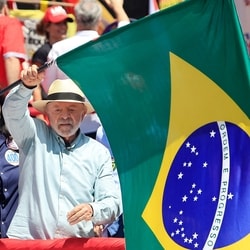 Brazil's President and presidential candidate Luiz Inacio Lula da Silva waves a national flag during a campaign rally in Sao Paulo, Brazil, on September 26, 2026.