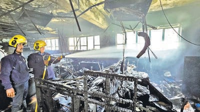 A fire broke out in a sixth-floor office at the Bank of India building on crowded Laxmi Road on Tuesday. (HT) A fire broke out in a sixth-floor office at the Bank of India building on crowded Laxmi Road on Tuesday. (HT)