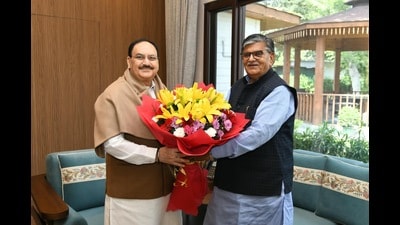 UT administrator Gulab Chand Kataria with Union health and family welfare minister JP Nadda in New Delhi on Tuesday. (HT Photo)