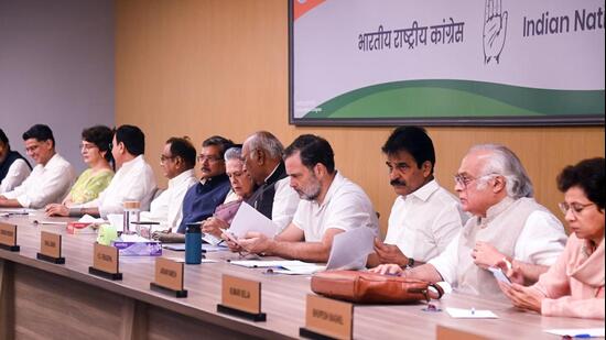 AICC president and Rajya Sabha LoP Mallikarjun Kharge, Lok Sabha LoP Rahul Gandhi, Congress chairperson Sonia Gandhi, and AICC secretaries Priyanka Gandhi Vadra, KC Venugopal, Selja Kumari, and Jairam Ramesh, and others at the Congress Working Committee (CWC) meeting at Indira Bhawan, in New Delhi on Tuesday. (AICC/ANI)