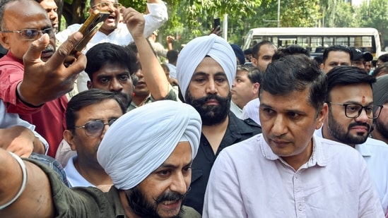 AAP Delhi protest highlights: Aam Aadmi Party MLA Jarnail Singh, ex-MLA Saurabh Bharadwaj staged a protest outside the Delhi Police Commissioner’s office, demanding an FIR against Delhi PWD Minister Parvesh Verma over an alleged slapping incident involving a youth during a road inspection in Tilak Nagar, in New Delhi on Tuesday. AAP Delhi protest highlights: Aam Aadmi Party MLA Jarnail Singh, ex-MLA Saurabh Bharadwaj staged a protest outside the Delhi Police Commissioner’s office, demanding an FIR against Delhi PWD Minister Parvesh Verma over an alleged slapping incident involving a youth during a road inspection in Tilak Nagar, in New Delhi on Tuesday.