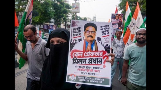 Congress party workers participate in a protest rally against the arrest of Milan Pradhan in Kolkata, West Bengal on September 19. (PTI)