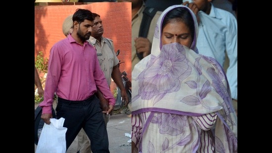 Convicts Sanjay Kumar Gupta and Anita Devi outside the Panchkula court on Tuesday. (Sant Arora/HT)
