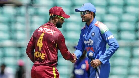 India's Captain Shubman Gill shakes hands with West Indies Captain Shai Hope before the start of the 1st ODI match between West Indies and India at the Greenfield International Stadium, in Thiruvananthapuram. (ANI Photo)